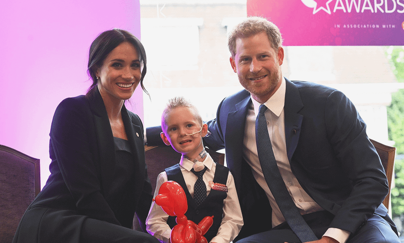 Меган Маркл и принц Гарри во время благотворительного визита