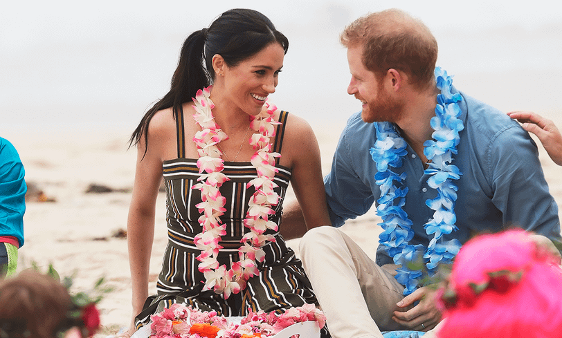 Меган Маркл с принцем Гарри во время совместного тура по Океании.